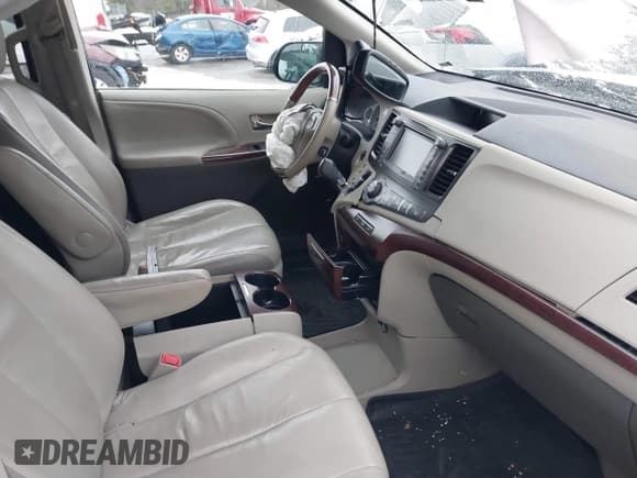 ✅ 2012 Toyota Sienna XLE • VIN: 5TDDK3DCXCS036006 • Lot: 41846007. Listed on IAAI with 188,555 mi. Free auction sales archive from the USA and detailed vehicle history report at DreamBid. Image 5.