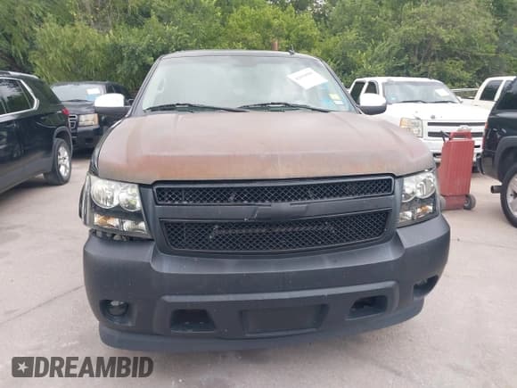 ✅ 2009 Chevrolet Tahoe LTZ • VIN: 1GNFC33J09R184315 • Lot: 42656000. Listed on IAAI with 216,835 mi. Free auction sales archive from the USA and detailed vehicle history report at DreamBid. Image 12.