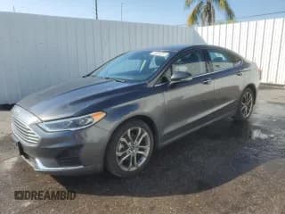 ✅ 2020 Ford Fusion SEL • VIN: 3FA6P0CD6LR192586 • Лот: 93102645. Опубликован ранее на Copart с пробегом 125 313 миль. Бесплатный доступ к архиву аукционных продаж из США и подробный отчёт об истории автомобиля на DreamBid. Изображение 1.