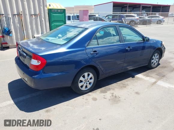 ✅ 2004 Toyota Camry LE • VIN: JTDBF30K140157536 • Lot: 42573358. Listed on IAAI with 133,732 mi. Free auction sales archive from the USA and detailed vehicle history report at DreamBid. Image 4.