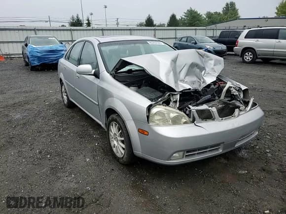 ✅ 2005 Suzuki Forenza LX • VIN: KL5JJ56Z85K132557 • Lot: 80202535. Wystawiony na Copart z przebiegiem Nie podano. Bezpłatny archiwum sprzedaży aukcyjnych z USA i szczegółowy raport historii pojazdu na DreamBid. Zdjęcie 13.