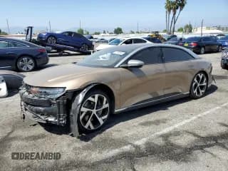 ✅ 2022 Lucid Air • VIN: 50EA1DAA5NA002114 • Lot: 57169365. Wystawiony na Copart z przebiegiem Nie podano. Bezpłatny archiwum sprzedaży aukcyjnych z USA i szczegółowy raport historii pojazdu na DreamBid. Zdjęcie 1.