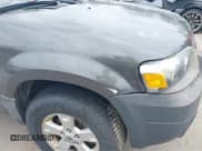 ✅ 2005 Ford Escape XLT • VIN: 1FMYU93185DA12392 • Lot: 42307875. Listed on IAAI with 187,239 mi. Free auction sales archive from the USA and detailed vehicle history report at DreamBid. Image 6.