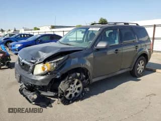 ✅ 2010 Mazda Tribute Sport • VIN: 4F2CY0C78AKM04670 • Лот: 63527224. Опубликован ранее на Copart с пробегом 114 196 миль. Бесплатный доступ к архиву аукционных продаж из США и подробный отчёт об истории автомобиля на DreamBid. Изображение 1.
