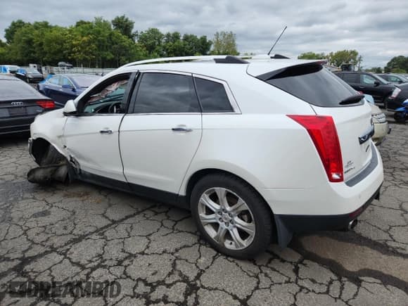 ✅ 2015 Cadillac SRX Performance Collection • VIN: 3GYFNFE31FS531821 • Lot: 68568995. Listed on Copart with 90,227 mi. Free auction sales archive from the USA and detailed vehicle history report at DreamBid. Image 2.