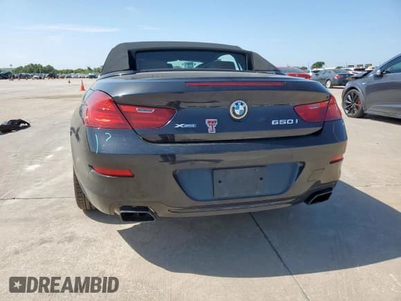 ✅ 2018 BMW 6 Series 650i xDrive • VIN: WBA6F7C57JG232299 • Лот: 64052295. Опубликован ранее на Copart с пробегом 29 027 миль. Бесплатный доступ к архиву аукционных продаж из США и подробный отчёт об истории автомобиля на DreamBid. Изображение 6.