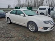 ✅ 2010 Ford Fusion Hybrid • VIN: 3FADP0L39AR228461 • Lot: 94741395. Listed on Copart with 131,394 mi. Free auction sales archive from the USA and detailed vehicle history report at DreamBid. Image 4.