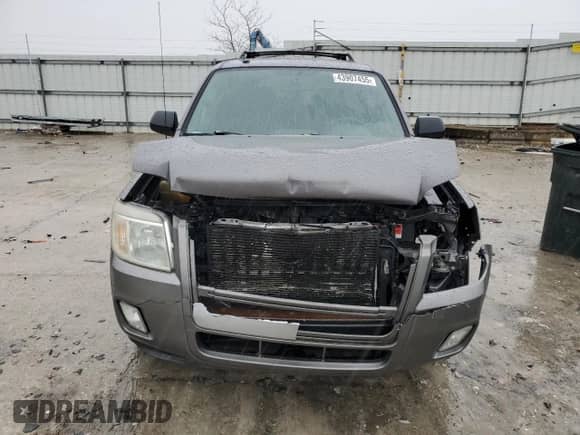 2009 Mercury Mariner z VIN 4M2CU81G39KJ17532, wystawiony jako Copart lot #43907455 z przebiegiem 214 212 mil mil oraz Szkoda całkowita • Salvage title. Historia ofert i sprzedaży dostępna na DreamBid. Obrazek 5.