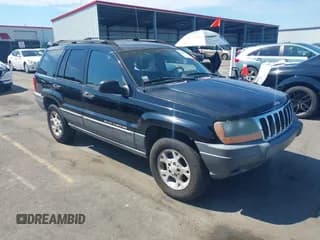 ✅ 2001 Jeep Grand Cherokee Laredo • VIN: 1J4GX48S91C729146 • Lot: 43105424. Listed on IAAI with 228,160 mi. Free auction sales archive from the USA and detailed vehicle history report at DreamBid. Image 1.