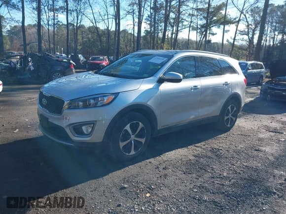 ✅ 2016 Kia Sorento EX • VIN: 5XYPHDA55GG175678 • Lot: 43906570. Listed on IAAI with 136,590 mi. Free auction sales archive from the USA and detailed vehicle history report at DreamBid. Image 2.