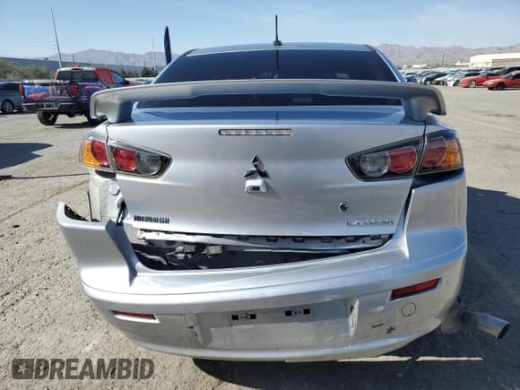 ✅ 2014 Mitsubishi Lancer GT • VIN: JA32U8FWXEU004031 • Lot: 52443945. Listed on Copart with 159,528 mi. Free auction sales archive from the USA and detailed vehicle history report at DreamBid. Image 6.