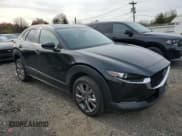 ✅ 2024 Mazda CX-30 S Carbon Edition • VIN: 3MVDMBCMXRM667456 • Lot: 91525845. Listed on Copart with 22,775 mi. Free auction sales archive from the USA and detailed vehicle history report at DreamBid. Image 4.