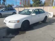 ✅ 1997 Toyota Camry LE • VIN: 4T1BG22KXVU760026 • Lot: 43838621. Listed on IAAI with 222,133 mi. Free auction sales archive from the USA and detailed vehicle history report at DreamBid. Image 2.