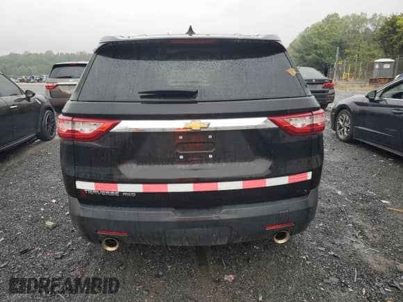 2018 Chevrolet Traverse LS с VIN 1GNEVFKW8JJ243117, выставлен на аукционе Copart как лот 84225565 с пробегом 108 949 миль миль и Списание • Salvage title. История ставок и продаж доступна на DreamBid. Изображение 6.