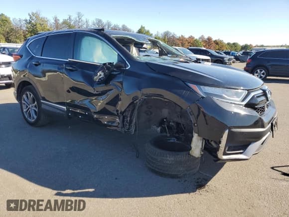 ✅ 2020 Honda CR-V Touring • VIN: 2HKRW2H92LH612695 • Lot: 84559165. Wystawiony na Copart z przebiegiem 62 150 mil. Bezpłatny archiwum sprzedaży aukcyjnych z USA i szczegółowy raport historii pojazdu na DreamBid. Zdjęcie 4.