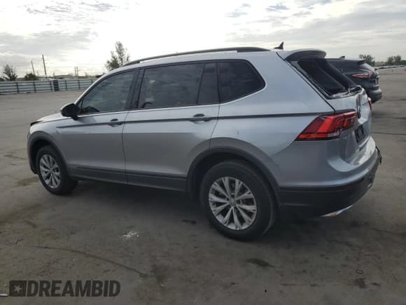 ✅ 2020 Volkswagen Tiguan S • VIN: 3VV1B7AXXLM171831 • Lot: 91294435. Listed on Copart with 119,459 mi. Free auction sales archive from the USA and detailed vehicle history report at DreamBid. Image 2.