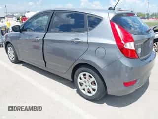 2014 Hyundai Accent GS with VIN KMHCT5AE9EU190260, listed as a IAAI auction lot 42739776 with 149,945 mi miles and . Bid and sale history available at DreamBid. Image 3.