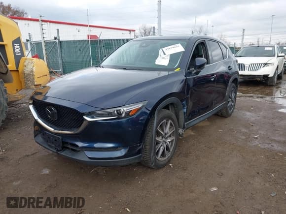 ✅ 2018 Mazda CX-5 Grand Touring • VIN: JM3KFBDM5J0426677 • Lot: 43579829. Listed on IAAI with 94,077 mi. Free auction sales archive from the USA and detailed vehicle history report at DreamBid. Image 12.