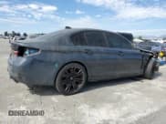 ✅ 2022 BMW M5 • VIN: WBS83CH06NCH65232 • Lot: 85136335. Listed on Copart with 24,615 mi. Free auction sales archive from the USA and detailed vehicle history report at DreamBid. Image 3.