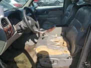 ✅ 2003 GMC Envoy SLE • VIN: 1GKDS13S032209380 • Lot: 57093225. Wystawiony na Copart z przebiegiem Nie podano. Bezpłatny archiwum sprzedaży aukcyjnych z USA i szczegółowy raport historii pojazdu na DreamBid. Zdjęcie 7.