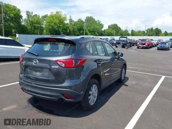 ✅ 2016 Mazda CX-5 Sport • VIN: JM3KE4BY4G0783619 • Lot: 42368512. Listed on IAAI with 115,694 mi. Free auction sales archive from the USA and detailed vehicle history report at DreamBid. Image 4.