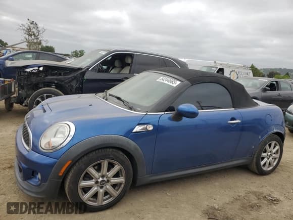 ✅ 2013 MINI Roadster S • VIN: WMWSY3C51DT593668 • Lot: 54244665. Listed on Copart with 205,177 mi. Free auction sales archive from the USA and detailed vehicle history report at DreamBid. Image 1.