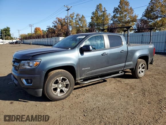 ✅ 2019 Chevrolet Colorado 4WD Z71 • VIN: 1GCGTDEN7K1132221 • Лот: 76713234. Опубликован ранее на Copart с пробегом 129 185 миль. Бесплатный доступ к архиву аукционных продаж из США и подробный отчёт об истории автомобиля на DreamBid. Изображение 1.