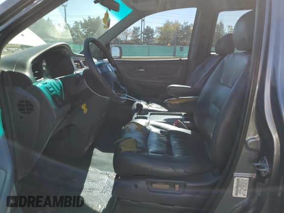 ✅ 2002 Honda Odyssey EX-L • VIN: 5FNRL18972B006051 • Lot: 87116615. Wystawiony na Copart z przebiegiem 257 803 mil. Bezpłatny archiwum sprzedaży aukcyjnych z USA i szczegółowy raport historii pojazdu na DreamBid. Zdjęcie 7.