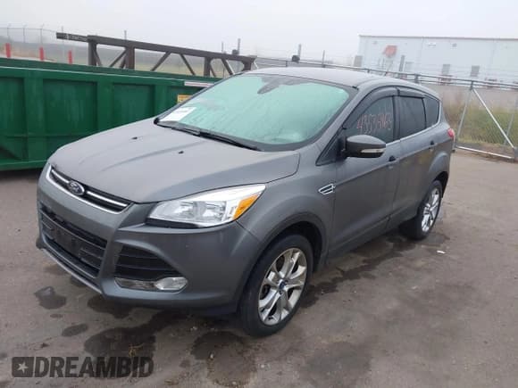 ✅ 2013 Ford Escape SEL • VIN: 1FMCU0H9XDUA10114 • Lot: 43535463. Listed on IAAI with 156,487 mi. Free auction sales archive from the USA and detailed vehicle history report at DreamBid. Image 2.