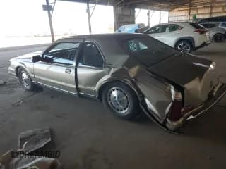 ✅ 1987 Lincoln Mark VII LSC • VIN: 1LNBM93M7HY658326 • Lot: 82710465. Wystawiony na Copart z przebiegiem 64 272 mil. Bezpłatny archiwum sprzedaży aukcyjnych z USA i szczegółowy raport historii pojazdu na DreamBid. Zdjęcie 2.