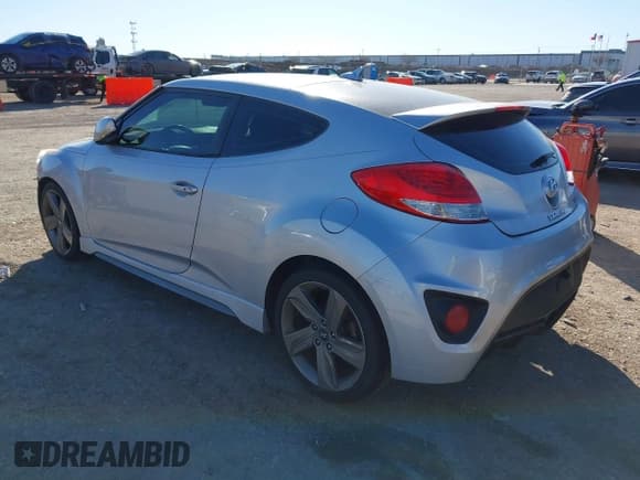✅ 2013 Hyundai Veloster Turbo • VIN: KMHTC6AE6DU162372 • Lot: 41481820. Wystawiony na IAAI z przebiegiem 105 650 mil. Bezpłatny archiwum sprzedaży aukcyjnych z USA i szczegółowy raport historii pojazdu na DreamBid. Zdjęcie 3.