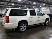 ✅ 2012 Chevrolet Suburban LTZ • VIN: 1GNSKKE71CR217486 • Lot: 74554544. Listed on Copart with 240,812 mi. Free auction sales archive from the USA and detailed vehicle history report at DreamBid. Image 3.