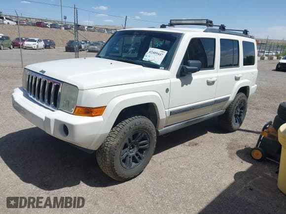 ✅ 2007 Jeep Commander Sport • VIN: 1J8HG48P97C601058 • Lot: 42489447. Listed on IAAI with 200,103 mi. Free auction sales archive from the USA and detailed vehicle history report at DreamBid. Image 2.
