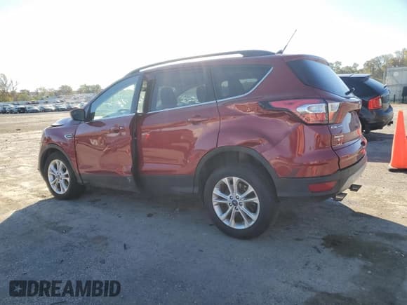 ✅ 2018 Ford Escape SE • VIN: 1FMCU9GD6JUD18905 • Lot: 89444695. Wystawiony na Copart z przebiegiem 120 268 mil. Bezpłatny archiwum sprzedaży aukcyjnych z USA i szczegółowy raport historii pojazdu na DreamBid. Zdjęcie 2.