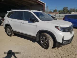 ✅ 2023 Honda Passport TrailSport • VIN: 5FNYF8H62PB019346 • Lot: 64276333. Listed on Copart with 1,453 mi. Free auction sales archive from the USA and detailed vehicle history report at DreamBid. Image 4.