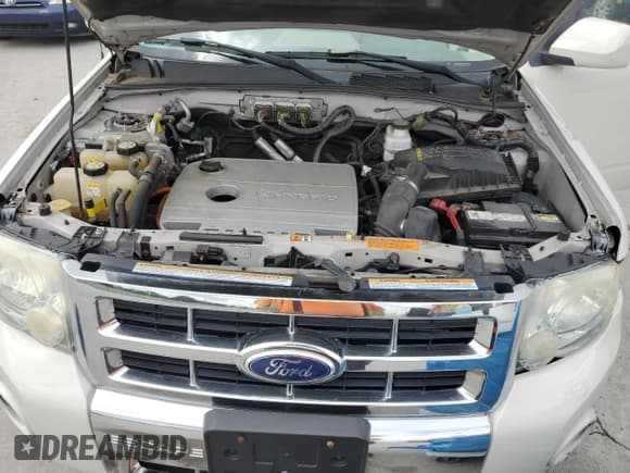 ✅ 2010 Ford Escape Hybrid • VIN: 1FMCU4K33AKB79376 • Lot: 58757405. Listed on Copart with 124,482 mi. Free auction sales archive from the USA and detailed vehicle history report at DreamBid. Image 12.