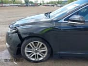 ✅ 2015 Lincoln MKZ • VIN: 3LN6L2G94FR625555 • Lot: 43052508. Listed on IAAI with 103,338 mi. Free auction sales archive from the USA and detailed vehicle history report at DreamBid. Image 20.