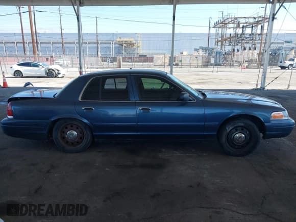 ✅ 2008 Ford Police Interceptor • VIN: 2FAFP71V48X179073 • Lot: 42690332. Listed on IAAI with Not provided. Free auction sales archive from the USA and detailed vehicle history report at DreamBid. Image 13.
