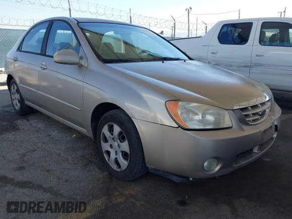 ✅ 2004 Kia Spectra LX • VIN: KNAFE122145041484 • Лот: 42268777. Опубликован ранее на IAAI с пробегом 102 020 миль. Бесплатный доступ к архиву аукционных продаж из США и подробный отчёт об истории автомобиля на DreamBid. Изображение 1.