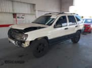 ✅ 2000 Jeep Grand Cherokee Laredo • VIN: 1J4GW48S3YC197566 • Лот: 43783685. Опубликован ранее на IAAI с пробегом 257 472 миль. Бесплатный доступ к архиву аукционных продаж из США и подробный отчёт об истории автомобиля на DreamBid. Изображение 2.