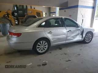 2007 Hyundai Azera SE с VIN KMHFC46FX7A175179, выставлен на аукционе Copart как лот 61747625 с пробегом 193 663 миль миль и Списание • Salvage title. История ставок и продаж доступна на DreamBid. Изображение 3.