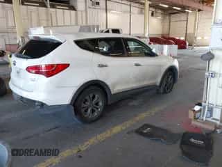 2015 Hyundai Santa Fe z VIN 5XYZTDLB4FG294735, wystawiony jako IAAI lot #43230960 z przebiegiem 169 342 mil mil oraz . Historia ofert i sprzedaży dostępna na DreamBid. Obrazek 4.