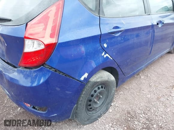 ✅ 2014 Hyundai Accent GS • VIN: KMHCT5AE9EU173569 • Lot: 43736252. Listed on IAAI with 167,396 mi. Free auction sales archive from the USA and detailed vehicle history report at DreamBid. Image 16.