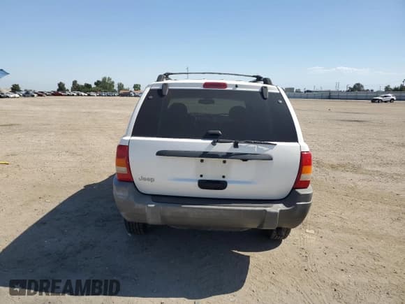 ✅ 1999 Jeep Grand Cherokee Laredo • VIN: 1J4G258S8XC735159 • Lot: 56247505. Wystawiony na Copart z przebiegiem 241 636 mil. Bezpłatny archiwum sprzedaży aukcyjnych z USA i szczegółowy raport historii pojazdu na DreamBid. Zdjęcie 6.