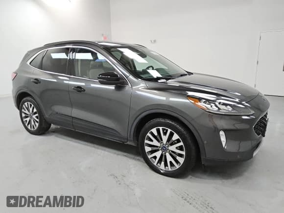 ✅ 2020 Ford Escape Titanium • VIN: 1FMCU9J90LUB20103 • Лот: 53809235. Опубликован ранее на Copart с пробегом 64 894 миль. Бесплатный доступ к архиву аукционных продаж из США и подробный отчёт об истории автомобиля на DreamBid. Изображение 4.