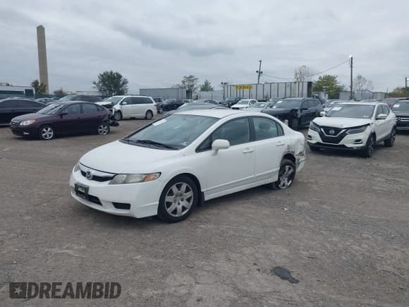 ✅ 2010 Honda Civic LX • VIN: 2HGFA1F54AH584725 • Lot: 43604109. Listed on IAAI with 197,012 mi. Free auction sales archive from the USA and detailed vehicle history report at DreamBid. Image 17.