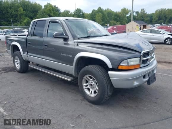 2002 Dodge Dakota SLT с VIN 1B7HG48N02S519241, выставлен на аукционе IAAI как лот 43121163 с пробегом 102 842 миль миль и . История ставок и продаж доступна на DreamBid. Изображение 1.