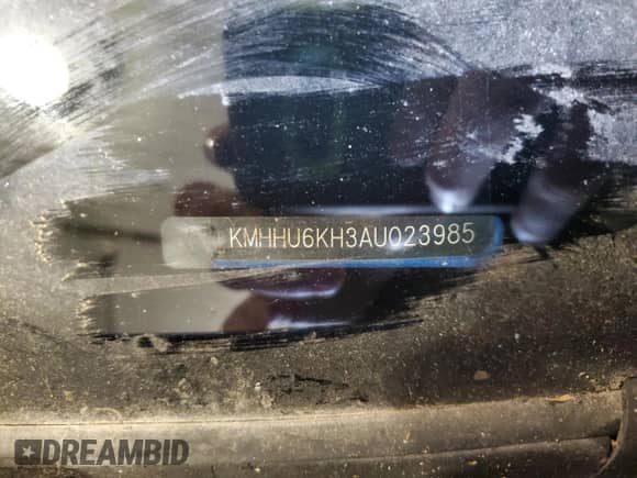 2010 Hyundai Genesis Coupe Track z VIN KMHHU6KH3AU023985, wystawiony jako Copart lot #47077255 z przebiegiem Nie podano mil oraz Szkoda całkowita • Salvage title. Historia ofert i sprzedaży dostępna na DreamBid. Obrazek 12.