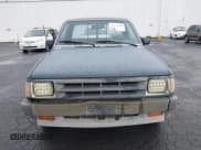 ✅ 1987 Mazda B-Series • VIN: JM2UF2111H0546977 • Lot: 41931286. Wystawiony na IAAI z przebiegiem 167 443 mil. Bezpłatny archiwum sprzedaży aukcyjnych z USA i szczegółowy raport historii pojazdu na DreamBid. Zdjęcie 6.