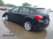 ✅ 2012 Subaru Impreza Premium • VIN: JF1GPAC65CH245193 • Lot: 42204378. Listed on IAAI with 197,832 mi. Free auction sales archive from the USA and detailed vehicle history report at DreamBid. Image 3.